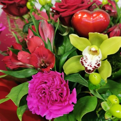 bold Valentine’s hand-tied bouquet with red and cerise flowers from West Malling Flowers