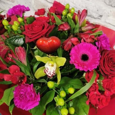 bold Valentine’s hand-tied bouquet with red and cerise flowers from West Malling Flowers