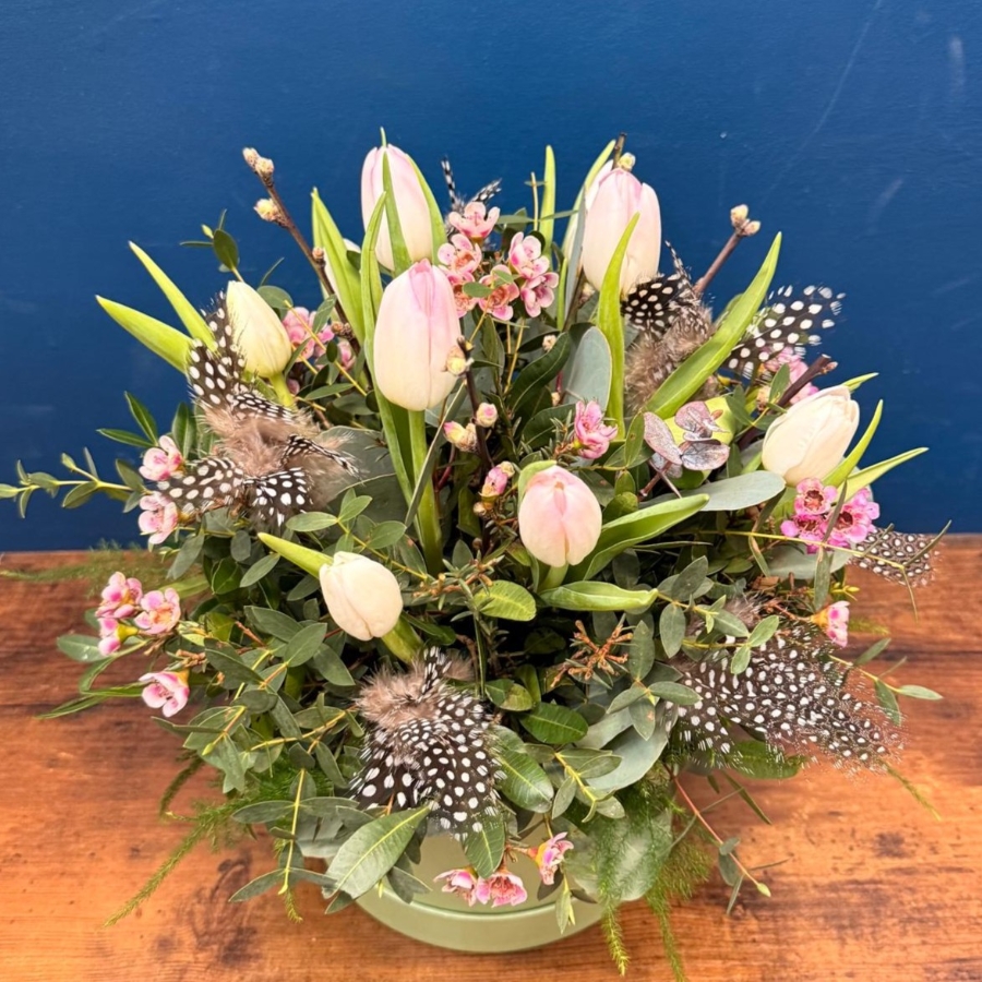 Spring hat box flower arrangement with pink and white seasonal flowers