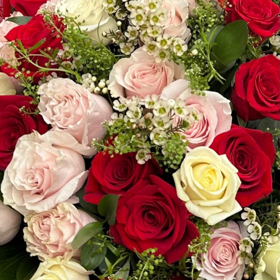 Luxury rose bouquet with 30 or 50 roses arranged as a large hand tied bouquet
