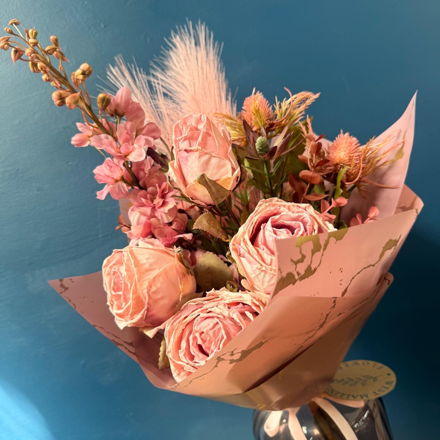 Pink silk flower bouquet with everlasting flowers and dried style textures gift wrapped