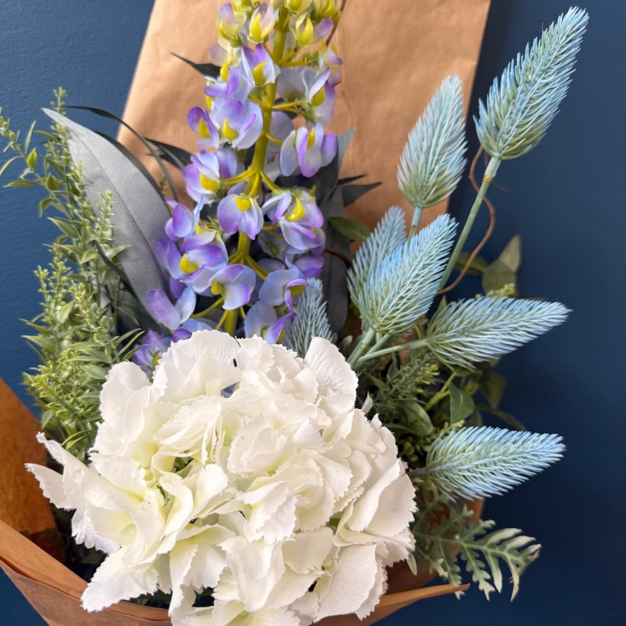 Gift wrapped silk flower bouquets with everlasting artificial flowers in mixed colours and styles