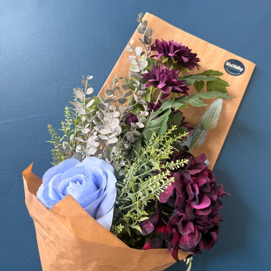 Gift wrapped silk flower bouquets with everlasting artificial flowers in mixed colours and styles