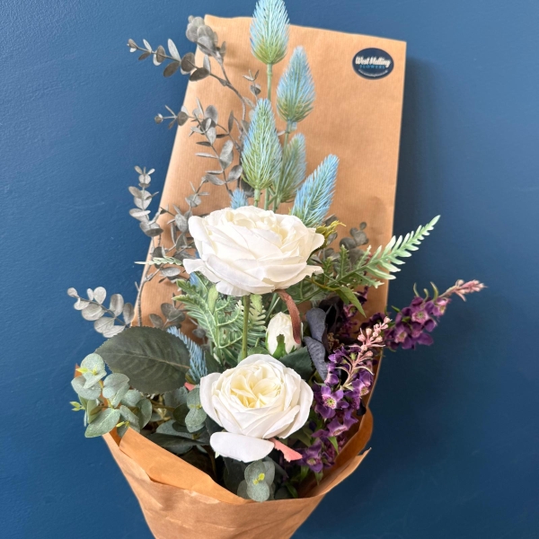 Gift wrapped silk flower bouquets with everlasting artificial flowers in mixed colours and styles