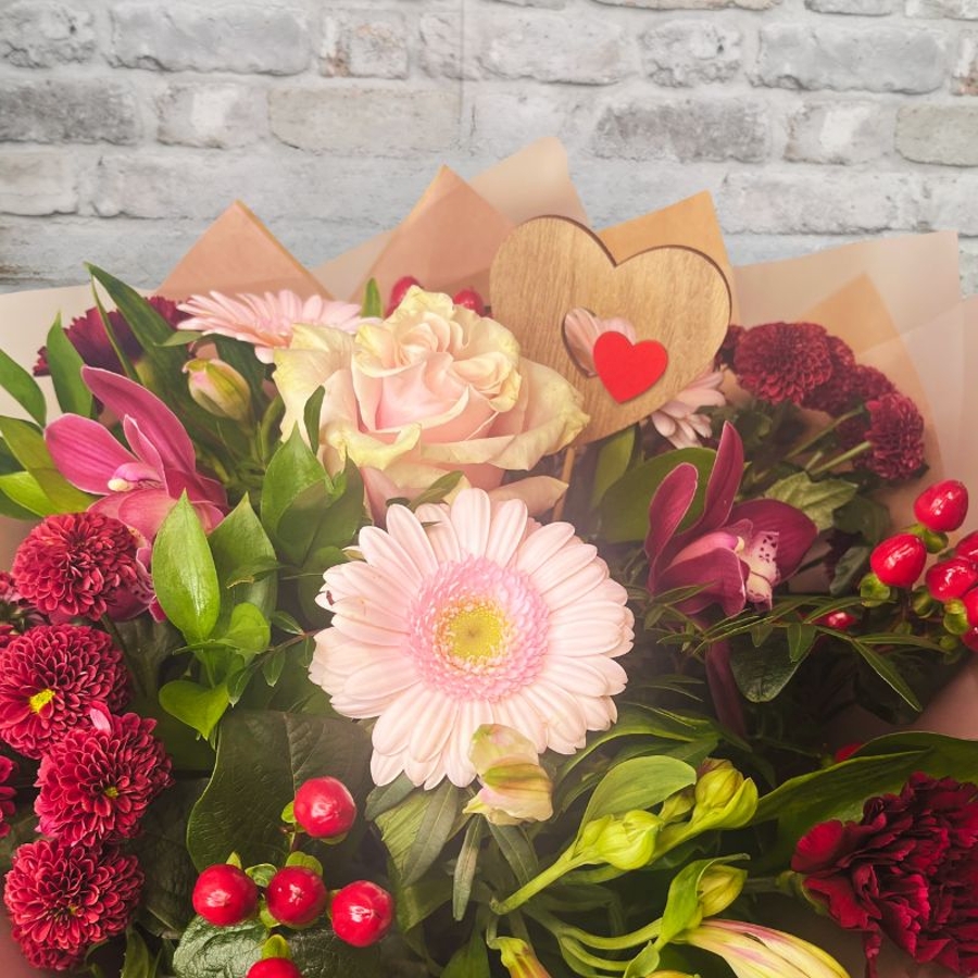 blush pink and burgundy Valentine’s hand-tied bouquet from West Malling Flowers
