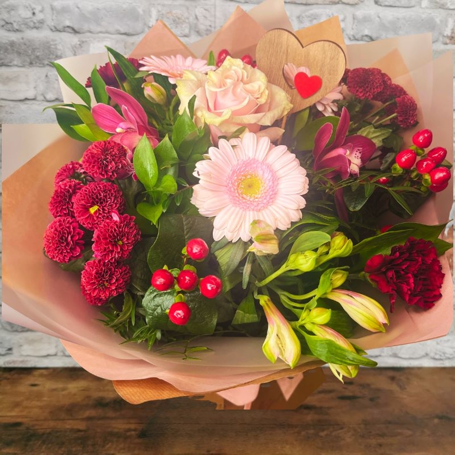 blush pink and burgundy Valentine’s hand-tied bouquet from West Malling Flowers