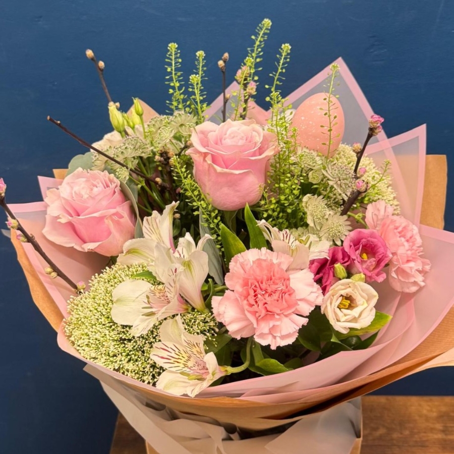 Soft pink spring bouquet with seasonal flowers