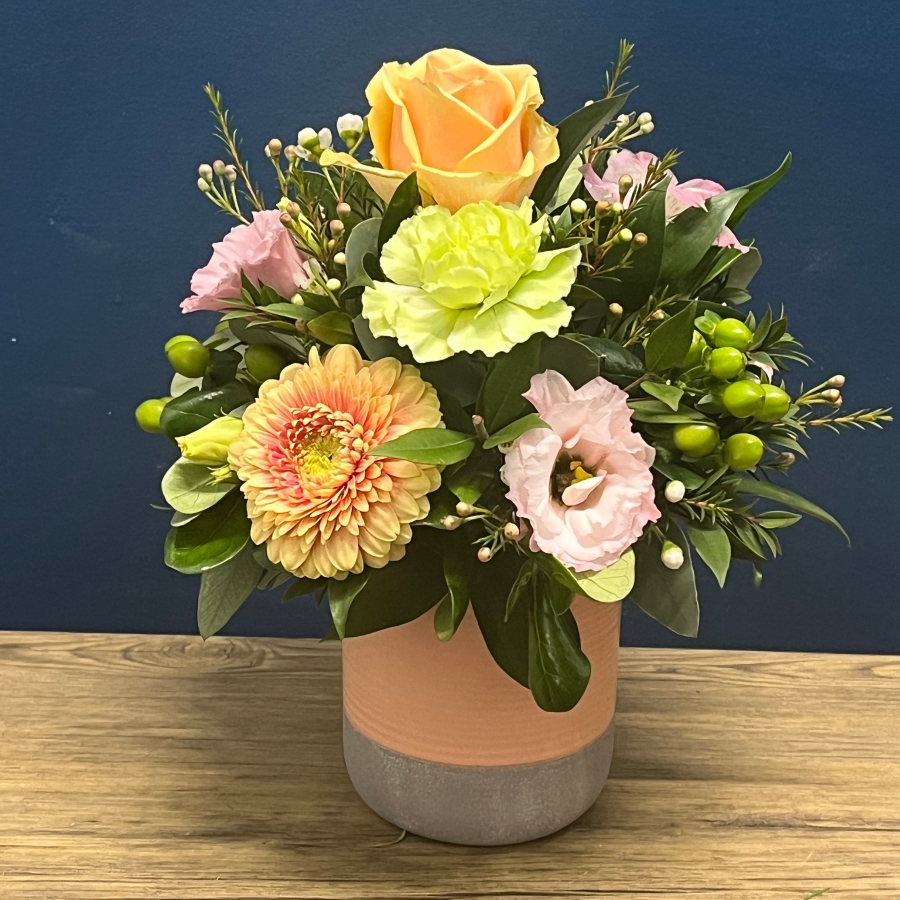 pastel peach and pink ceramic pot flower arrangement West Malling Flowers