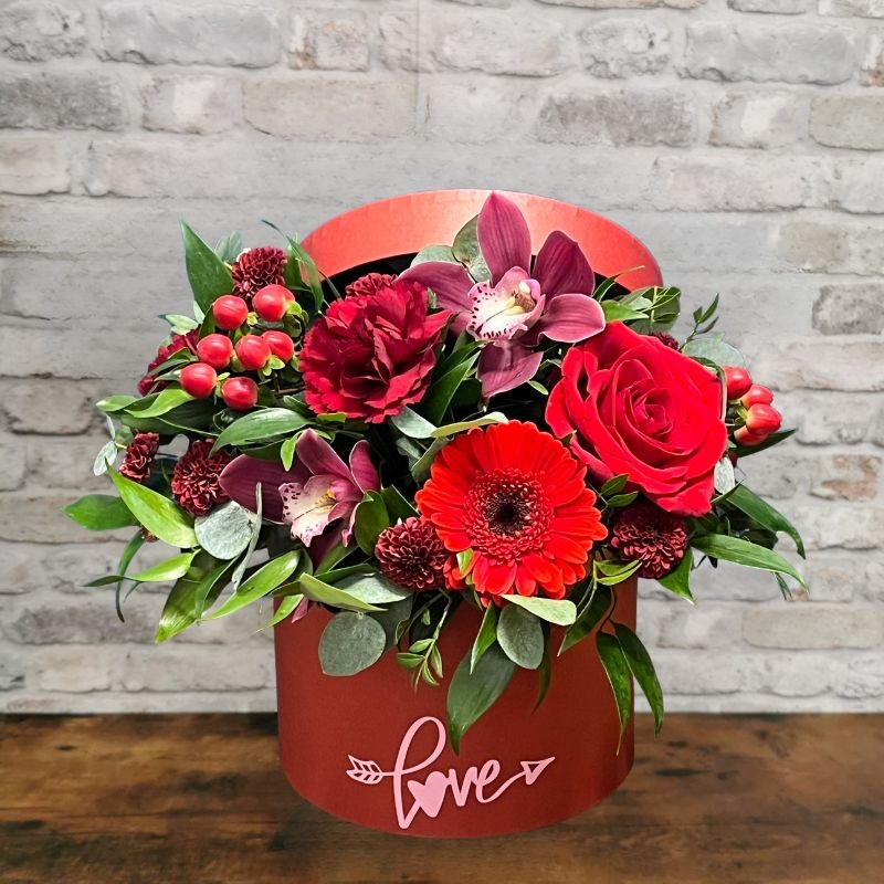 red rose Valentine’s hat box arrangement by West Malling Flowers
