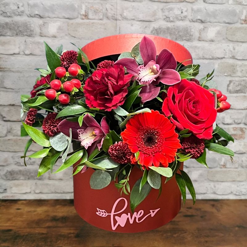red rose Valentine’s hat box arrangement by West Malling Flowers