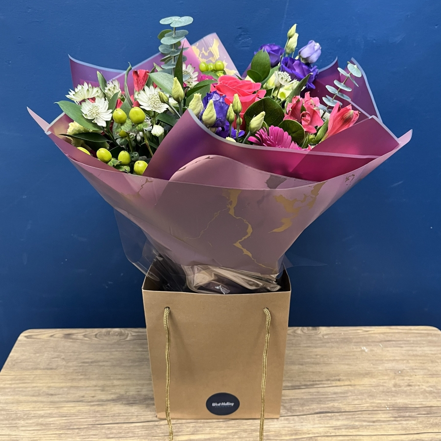 bright pink and purple hand-tied bouquet West Malling Flowers