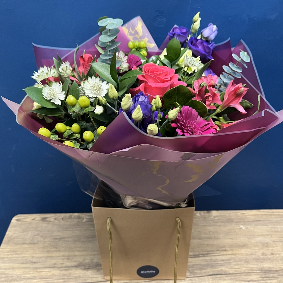 bright pink and purple hand-tied bouquet West Malling Flowers