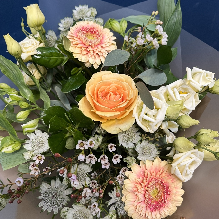 pastel peach and cream hand-tied bouquet from West Malling Flowers