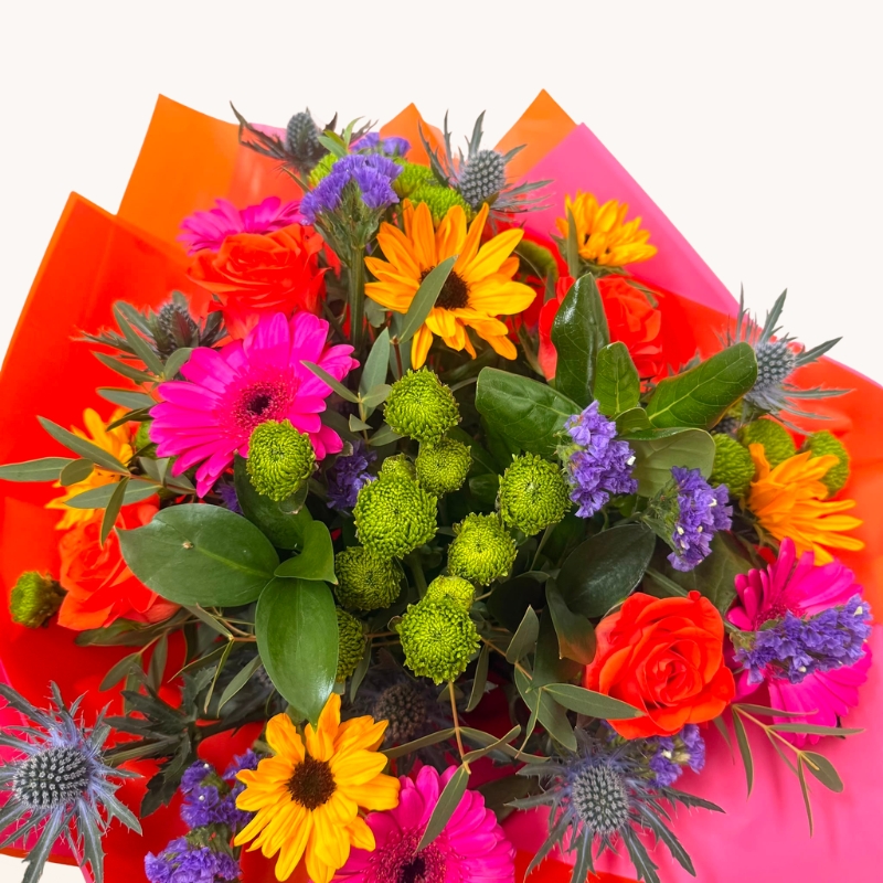 Summer Splash vibrant hand-tied bouquet with bright pink, orange, purple and blue seasonal flowers