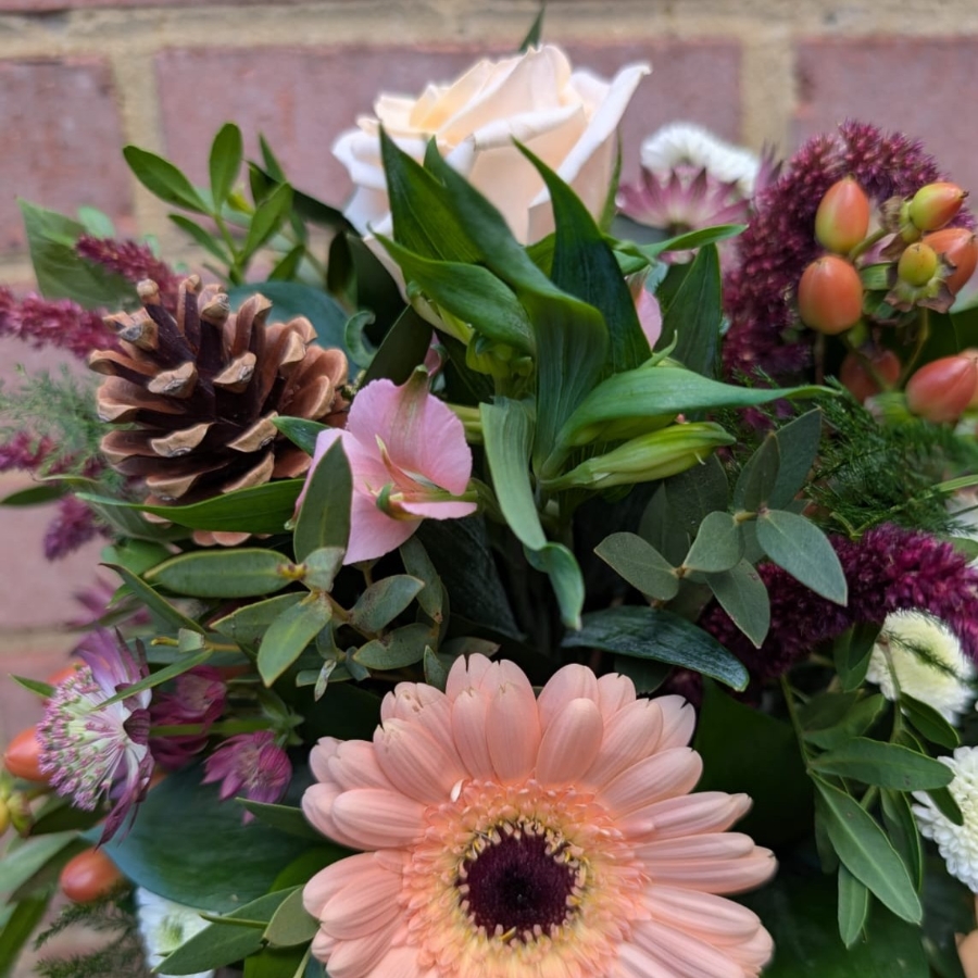 Autumn Haze ceramic pot arrangement with peach, blush, bronze and burgundy seasonal flowers