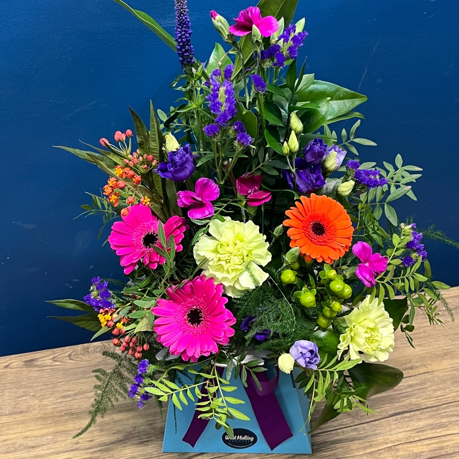 bright mixed flower arrangement in blue gift box West Malling Flowers