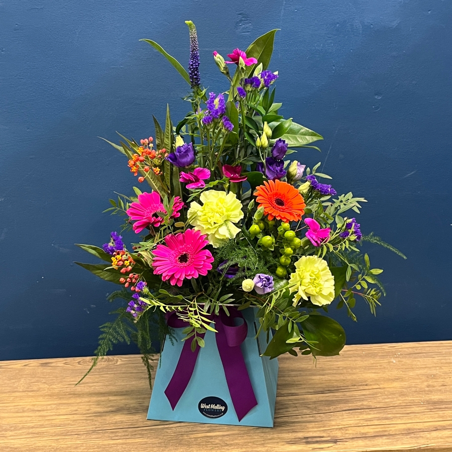 bright mixed flower arrangement in blue gift box West Malling Flowers