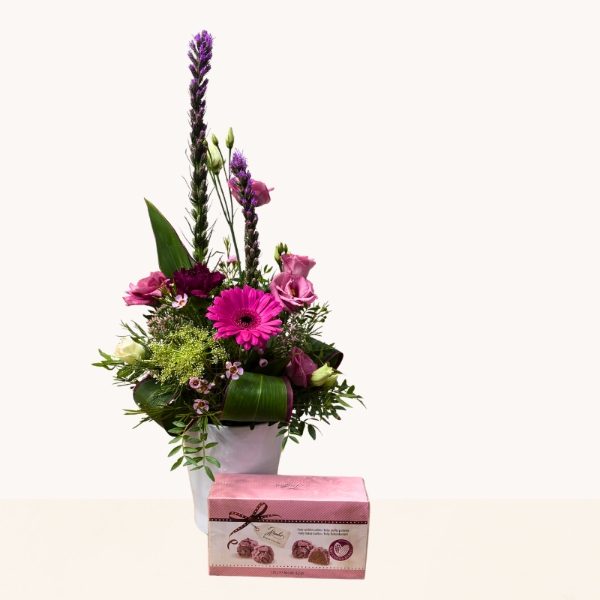 Summer Splash ceramic pot arrangement with vibrant pink and purple seasonal flowers by West Malling Flowers
