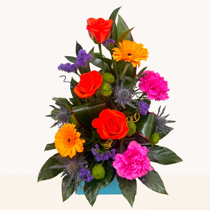 Summer Splash vibrant flower box arrangement with bright pink, orange, purple and blue seasonal flowers