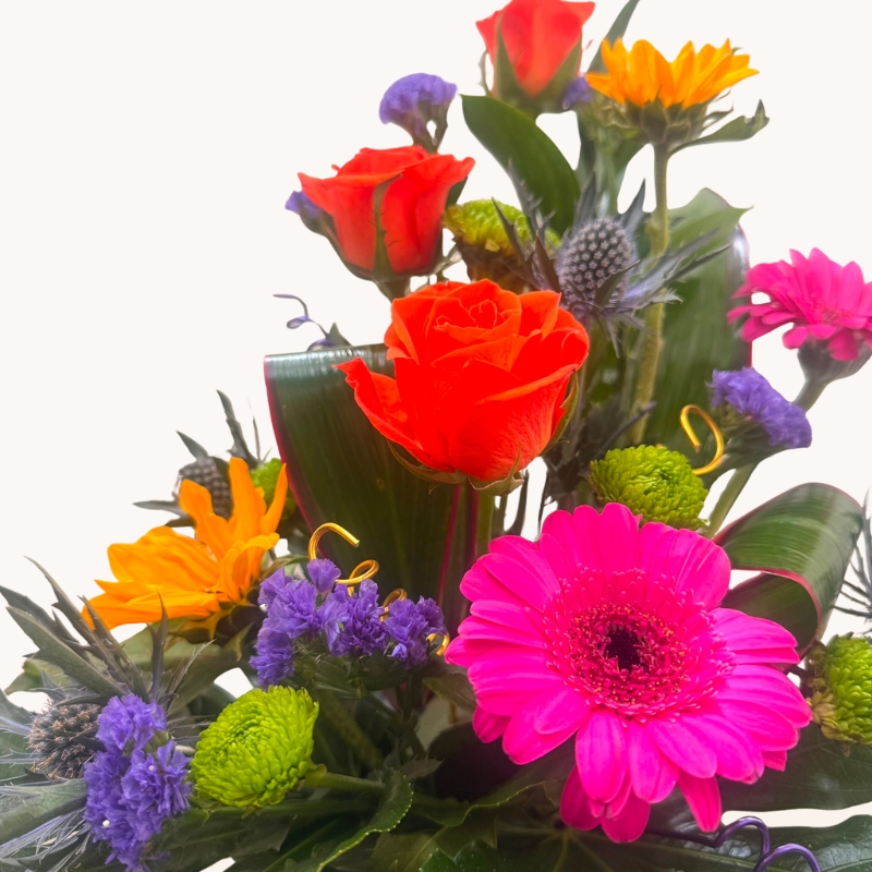 Summer Splash vibrant flower box arrangement with bright pink, orange, purple and blue seasonal flowers