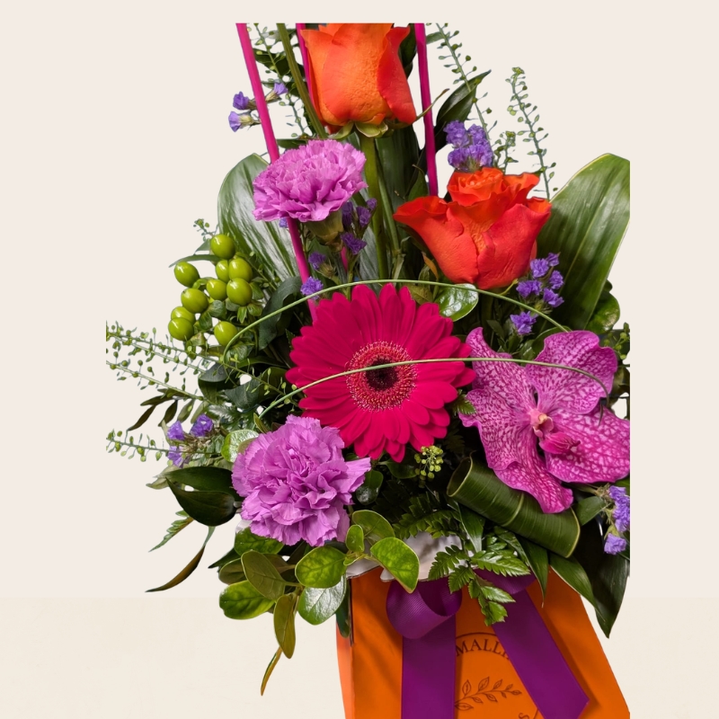 Summer flower box arrangement with pink lilac and purple seasonal flowers