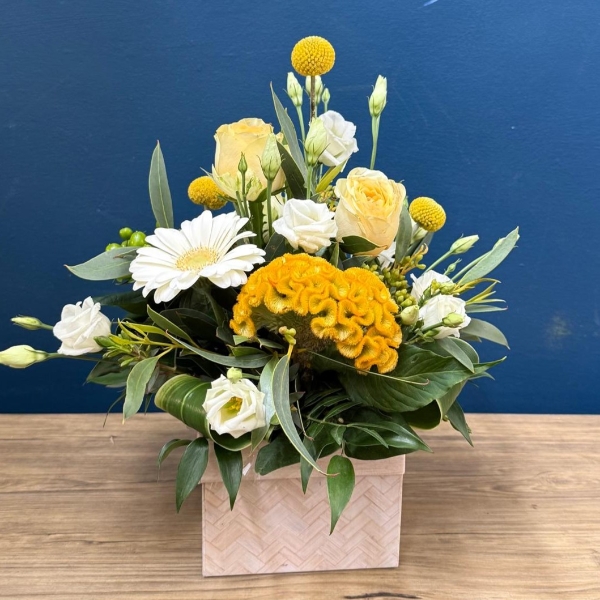 Citrus summer flower box arrangement with yellow white seasonal flowers in square box