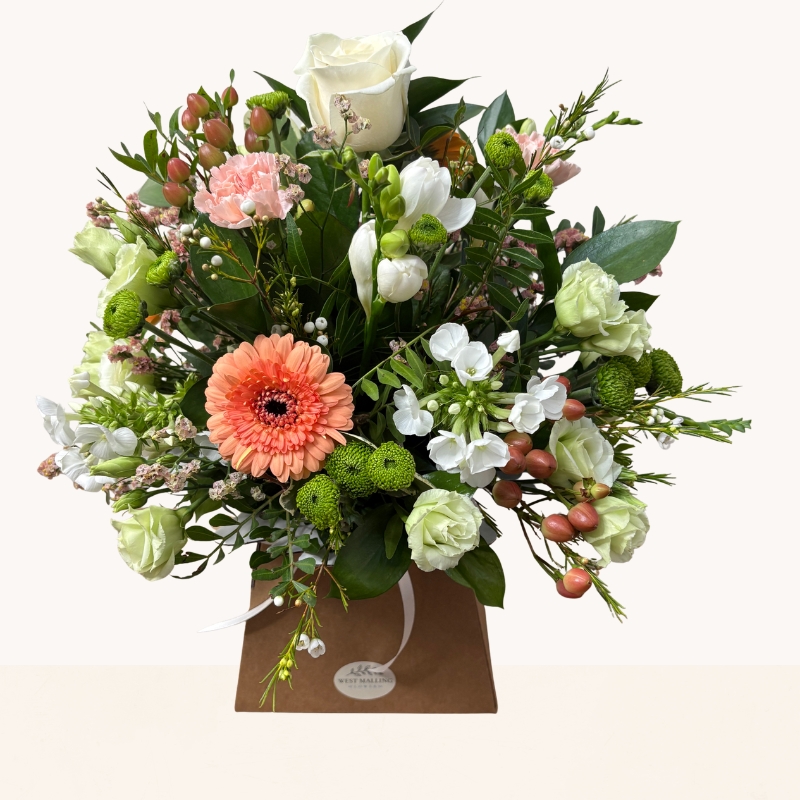 Summer Glow flower box arrangement with peach, white and green seasonal flowers by West Malling Flowers