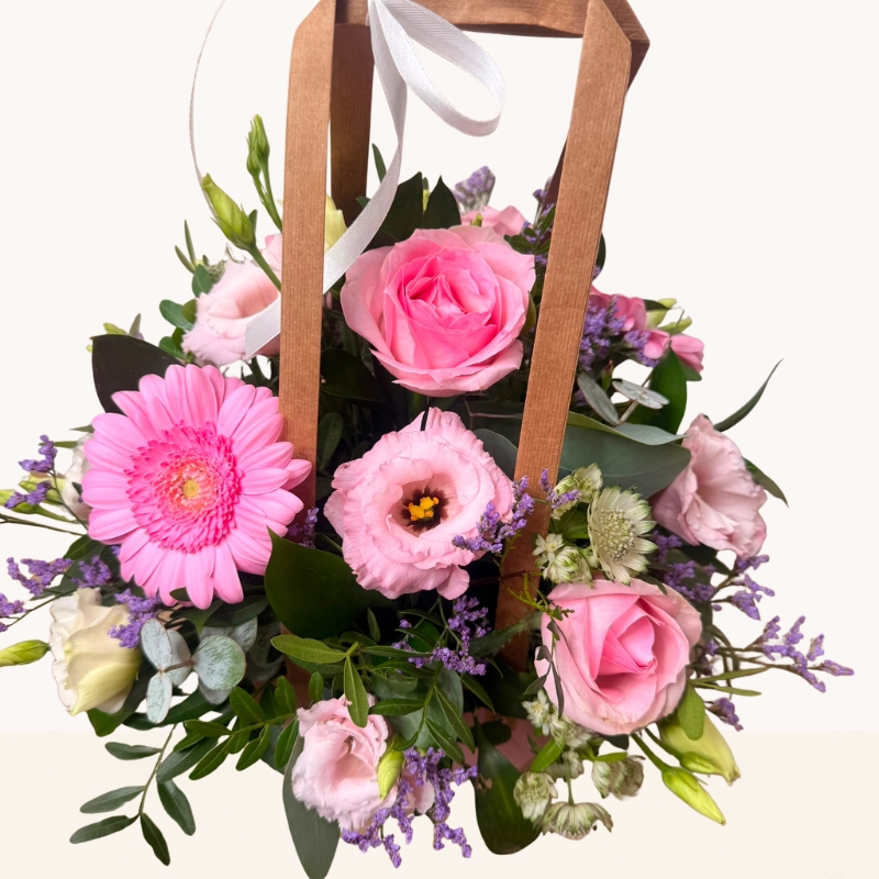 Summer Blush pink bag arrangement with pink roses, gerbera and soft pastel seasonal flowers