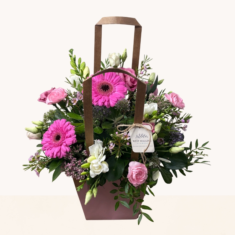 Summer Splash flower bag arrangement with vibrant pink, purple and white seasonal flowers by West Malling Flowers