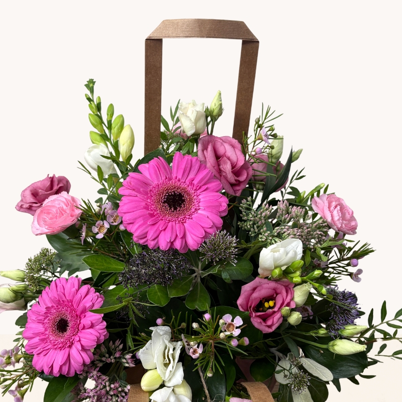 Summer Splash flower bag arrangement with vibrant pink, purple and white seasonal flowers by West Malling Flowers