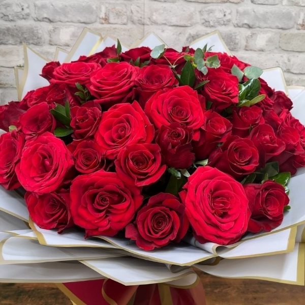 luxury 50 red rose hand-tied bouquet by West Malling Flowers