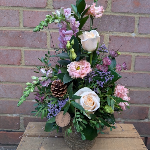 Autumn Blush seagrass pot arrangement with blush pink, champagne and lilac seasonal flowers