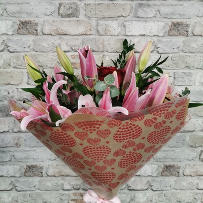 rose and lily Valentine’s bouquet arranged by West Malling Flowers