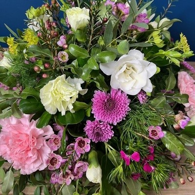 Mother’s Day remembrance posy with seasonal flowers suitable for a graveside tribute