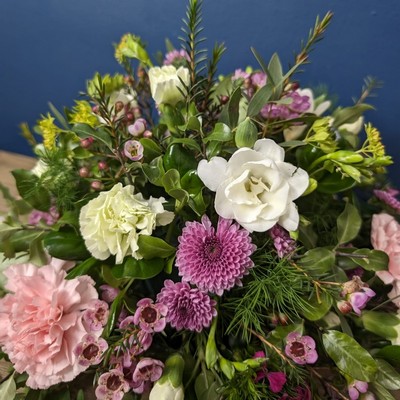 Mother’s Day remembrance posy with seasonal flowers suitable for a graveside tribute