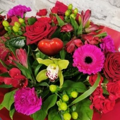 bold Valentine’s hand-tied bouquet with red and cerise flowers from West Malling Flowers