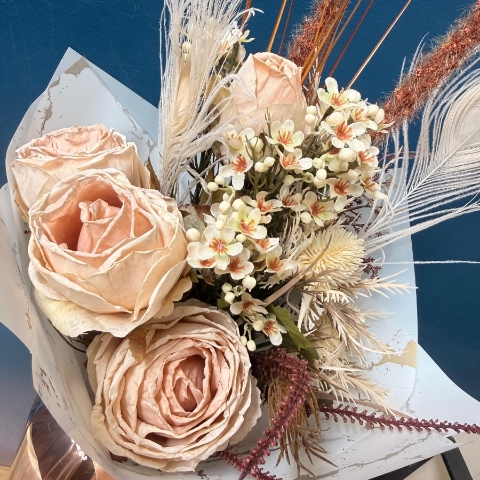 Neutral silk flower bouquet with cream everlasting flowers and dried style textures