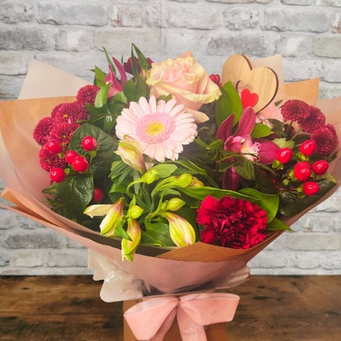 blush pink and burgundy Valentine’s hand-tied bouquet from West Malling Flowers