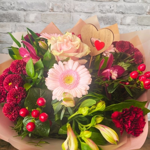 blush pink and burgundy Valentine’s hand-tied bouquet from West Malling Flowers