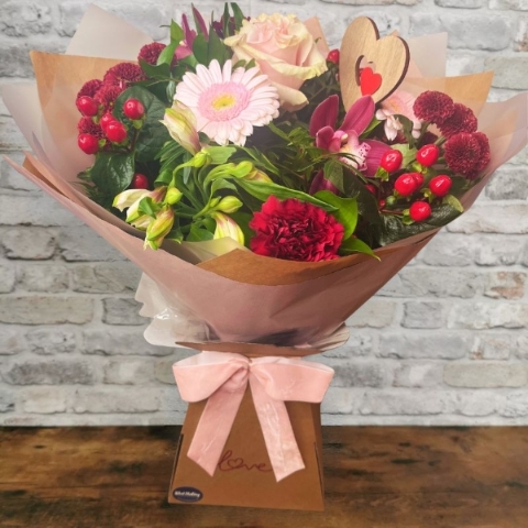 blush pink and burgundy Valentine’s hand-tied bouquet from West Malling Flowers