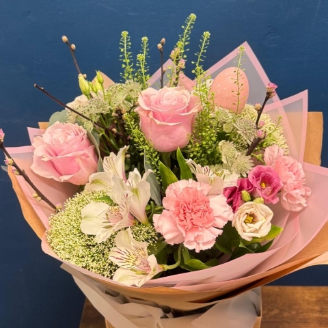 Soft pink spring bouquet with seasonal flowers