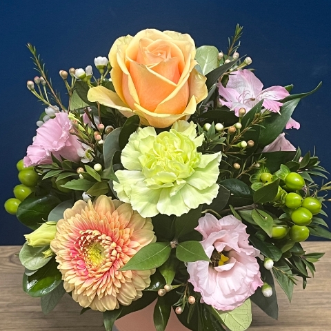 pastel peach and pink ceramic pot flower arrangement West Malling Flowers