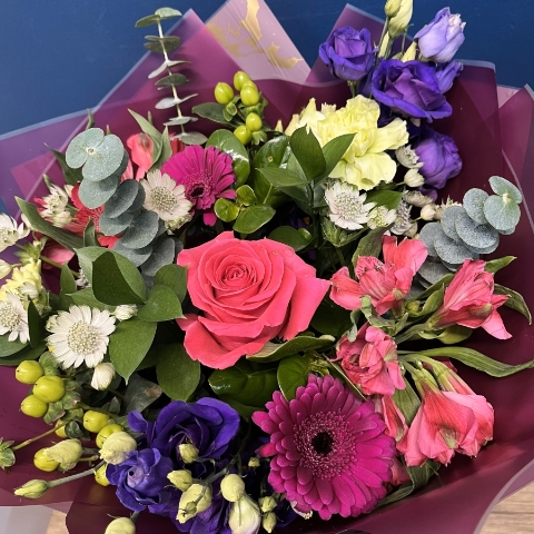 bright pink and purple hand-tied bouquet West Malling Flowers