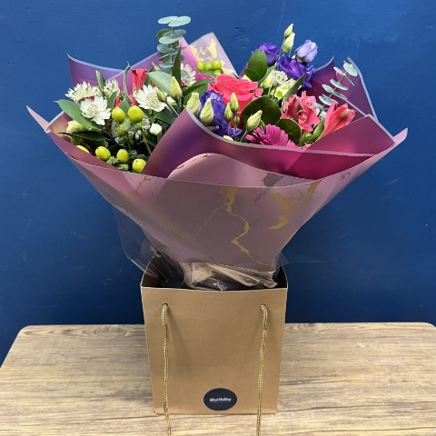 bright pink and purple hand-tied bouquet West Malling Flowers