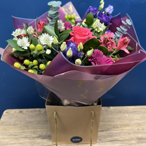 bright pink and purple hand-tied bouquet West Malling Flowers