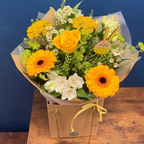 Yellow and white spring bouquet with seasonal flowers