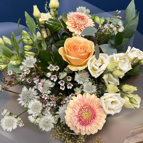 pastel peach and cream hand-tied bouquet from West Malling Flowers