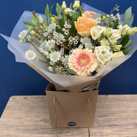 pastel peach and cream hand-tied bouquet from West Malling Flowers