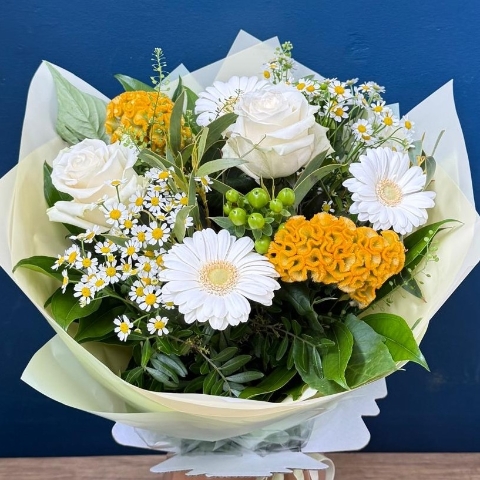 Lemon and white summer hand tied bouquet with seasonal flowers and fresh foliage