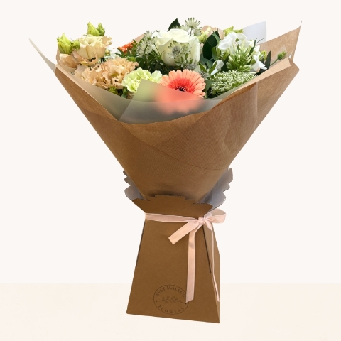 Late summer hand-tied bouquet with peach, cream and white seasonal flowers, fresh greenery and gift box.